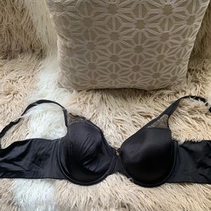 Cacique 42-C peek-a-boo black bra.